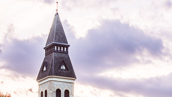 Anderson Hall tower with clouds