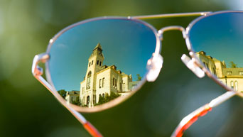 Anderson Hall in sunglasses reflection