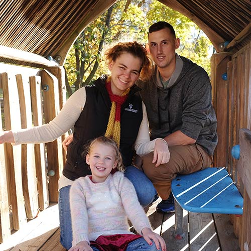 Mary Post with her husband and daughter