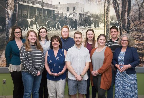 Lynn-Sherow, far right, with Chapman Center graduate and undergraduate student workers and staff.