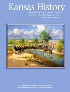 Cover of issue that is light blue with a colorful painting of wagons
