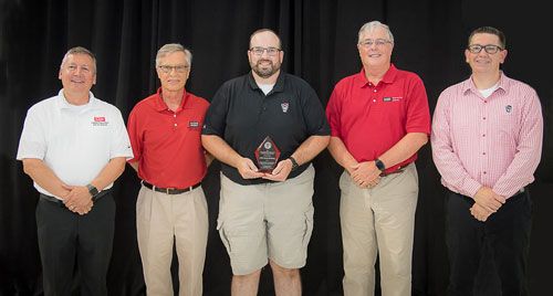 Colby Moorberg, associate professor in agronomy (center) receives the CALS Outstanding Young Alumni award from N.C. State University. Also pictured (l to r) is Richard Linton, Michael Vepraskas, Jeff Mullahey, and Chad Benton. Photo courtesy of NCSU.