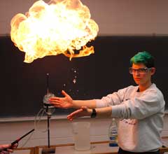 A member performing a chemistry demonstration.
