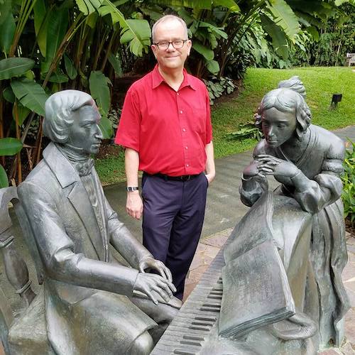 Dr. Slawomir Dobrzanski at the Frederic Chopin monument in Singapore