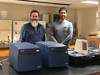 Drs. Umut Yucel and Randall Phebus receive donated analytical equipment from Mars Wrigley