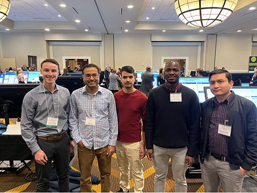 Pankaj Baral, second from left, at 2023 K-INBRE symposium with members of his research laboratory. From left to right, Michael Bartkoski (undergraduate student), Dr. Baral, and graduate students Prabhu Joshi, Chinemerem Onah, and Sandeep Adhikari. 