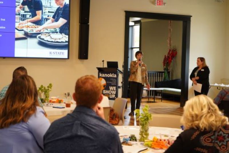 Quinlan Carttar, left, and Jenny Doty, food systems entrepreneurial resource navigators with K-State Research and Extension, lead a session focused on supporting food businesses in accessing licensed kitchens as part of the food entrepreneurship workshop.
