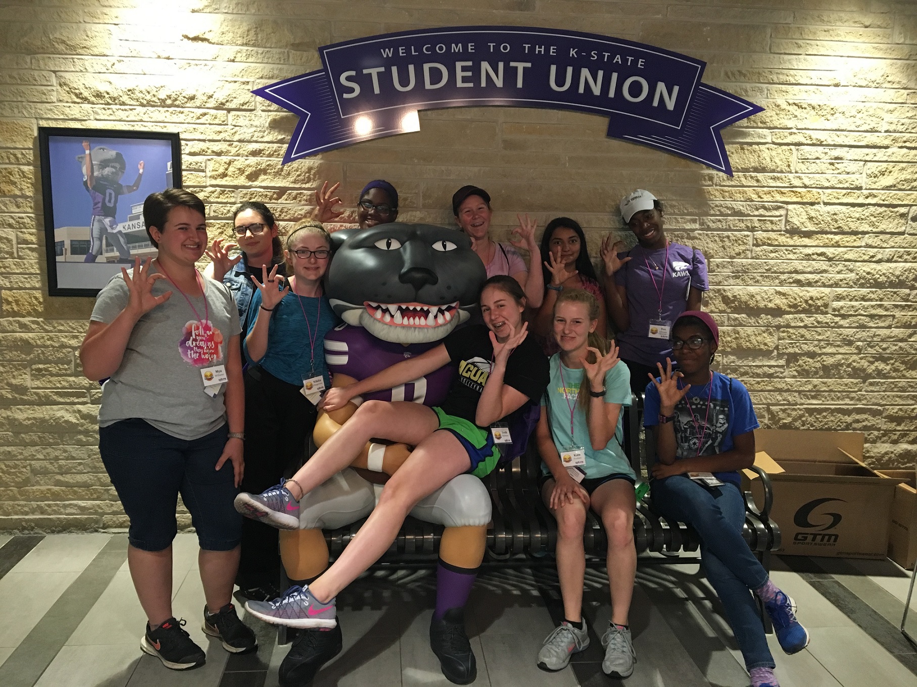 EXCITE students pose with Willie the Wildcat on a campus tour