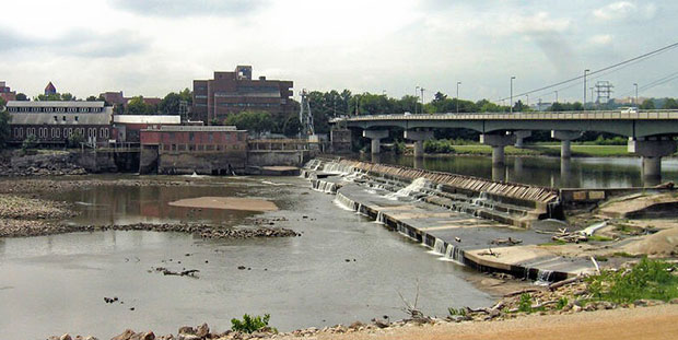 The Kansas River at Lawrence showing the Bowersock Dam (right) and power station (rear center) at a period of very low water flow