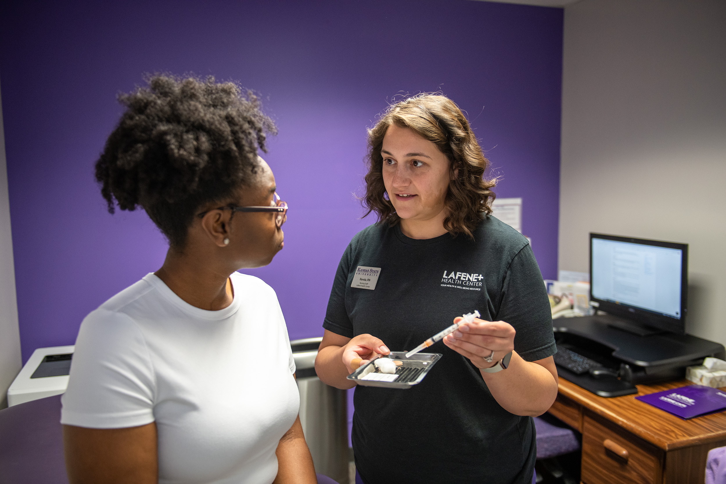 Student talking with nurse