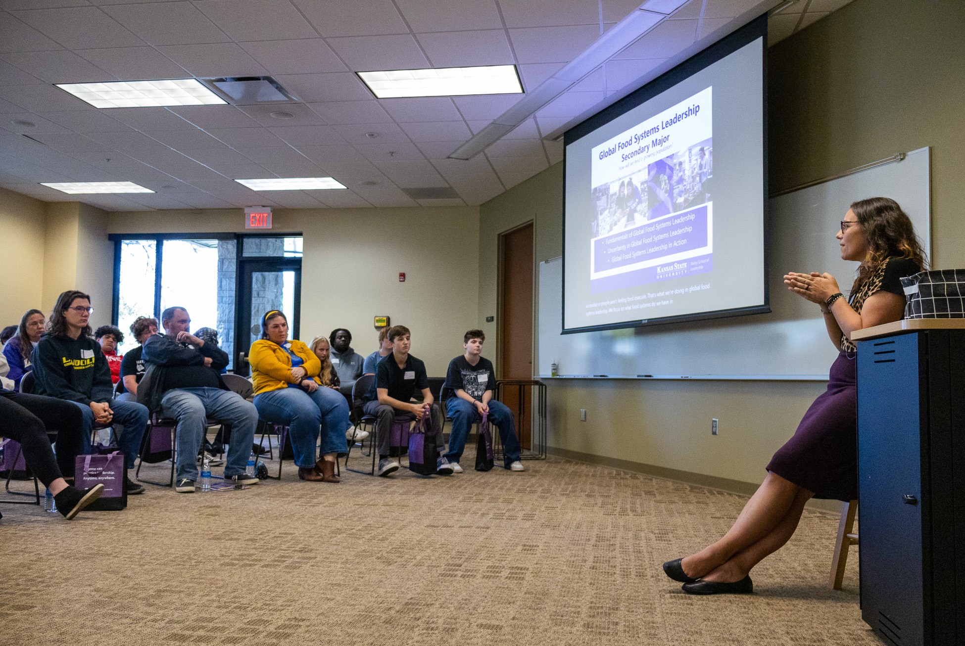 Woman leads classroom talk