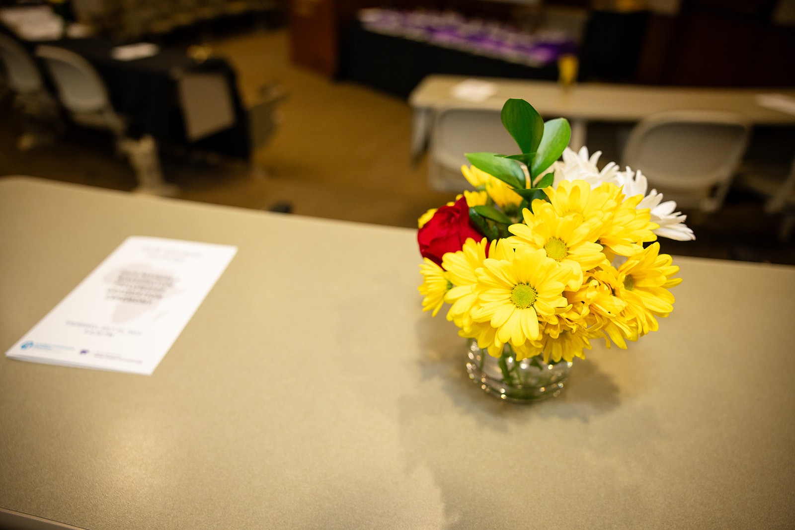 Vase of flowers on table