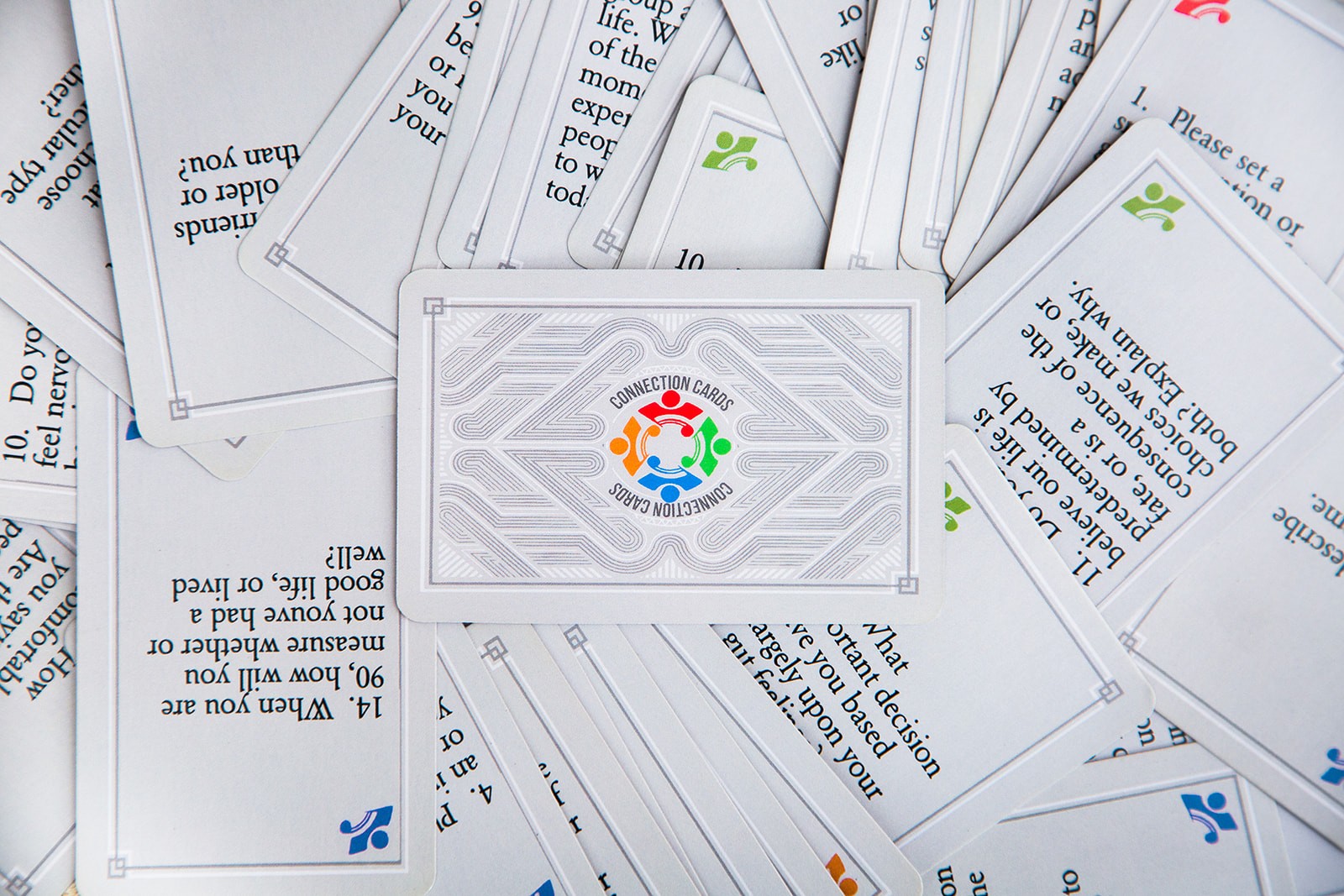 'Cats Connect question cards in a pile