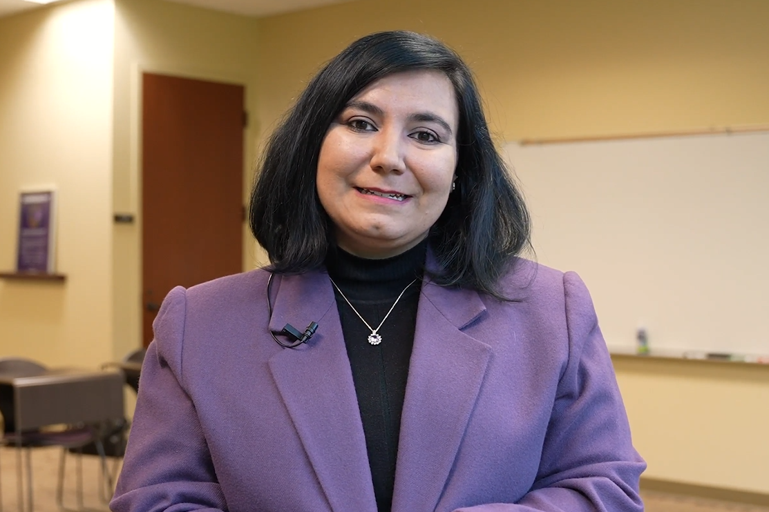 Woman in purple jacket