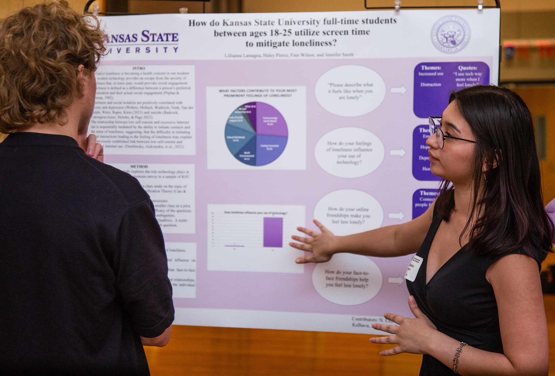 Student with research poster