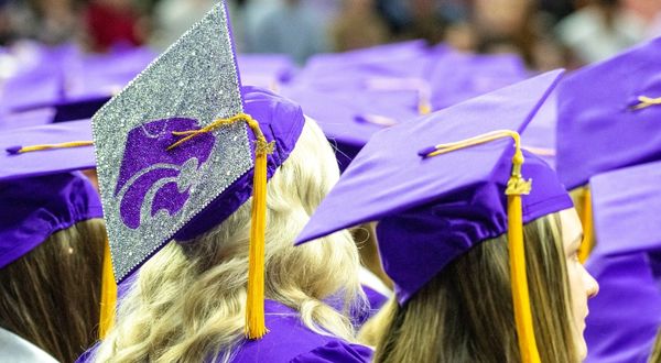 Photo of mortar board hats at K-State commencement