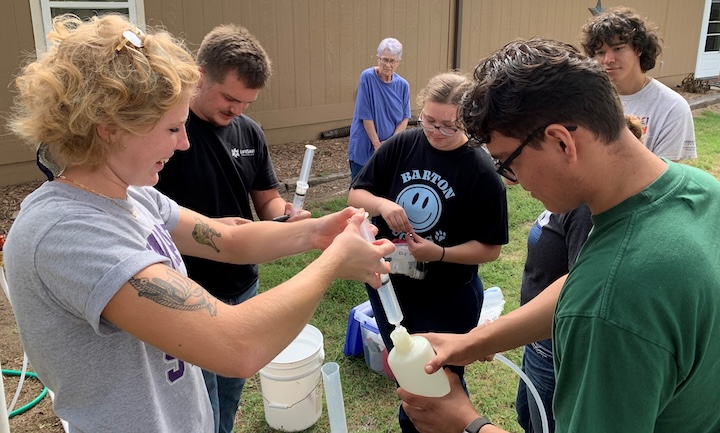 students testing well water