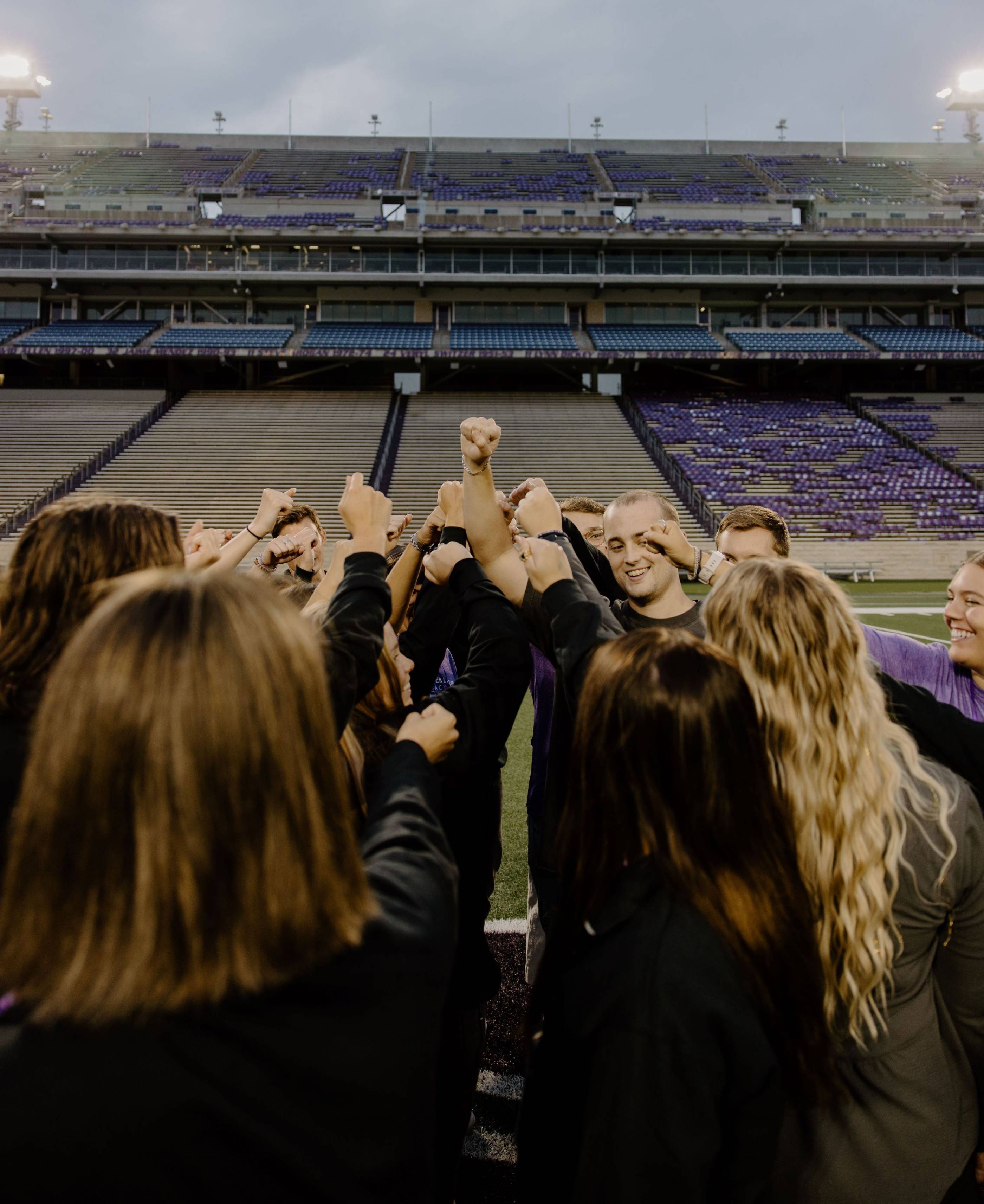 A group high five on the field