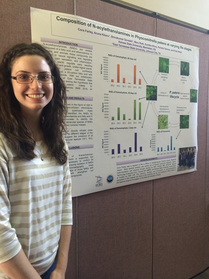 Cora Farley with her Research Poster