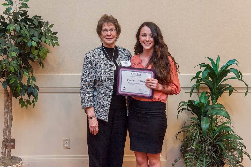 Kristen Wilbeck receiving the Regenia M. Hudiburg Award from JCRC advisory council member Edie Dahlsten