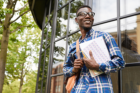 undergraduate student walking outside