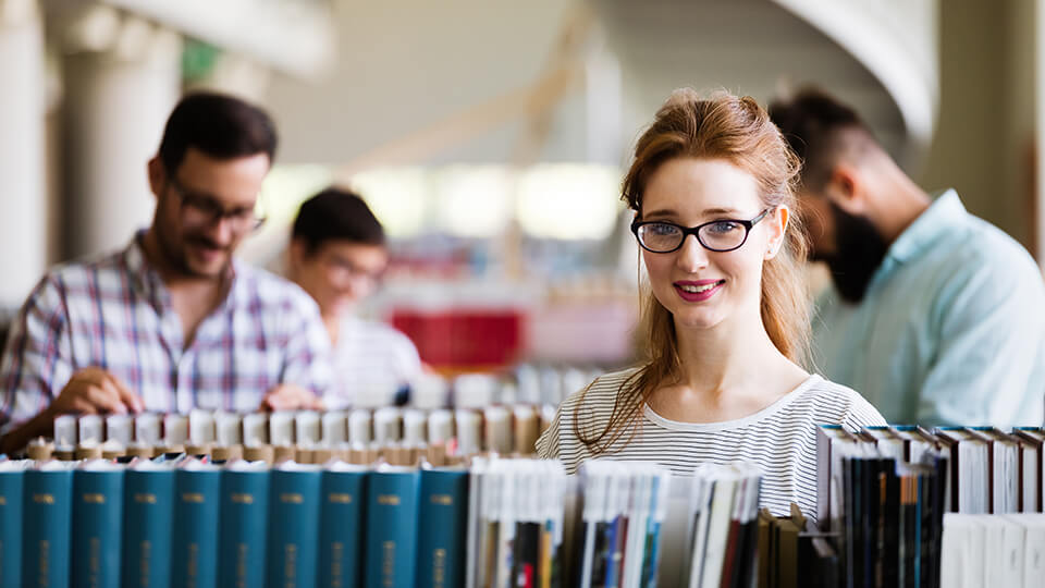 students studying at library