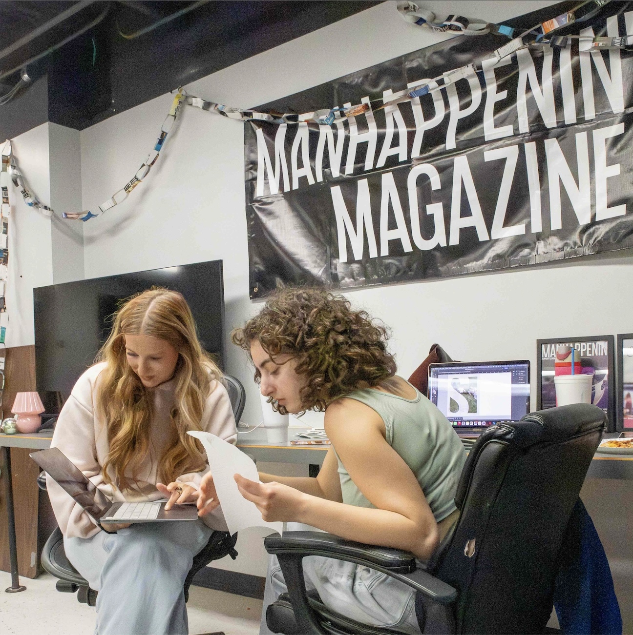 Students working on Manhappenin' Magazine