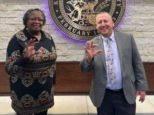 Njuguna with Kansas State University President Richard Linton