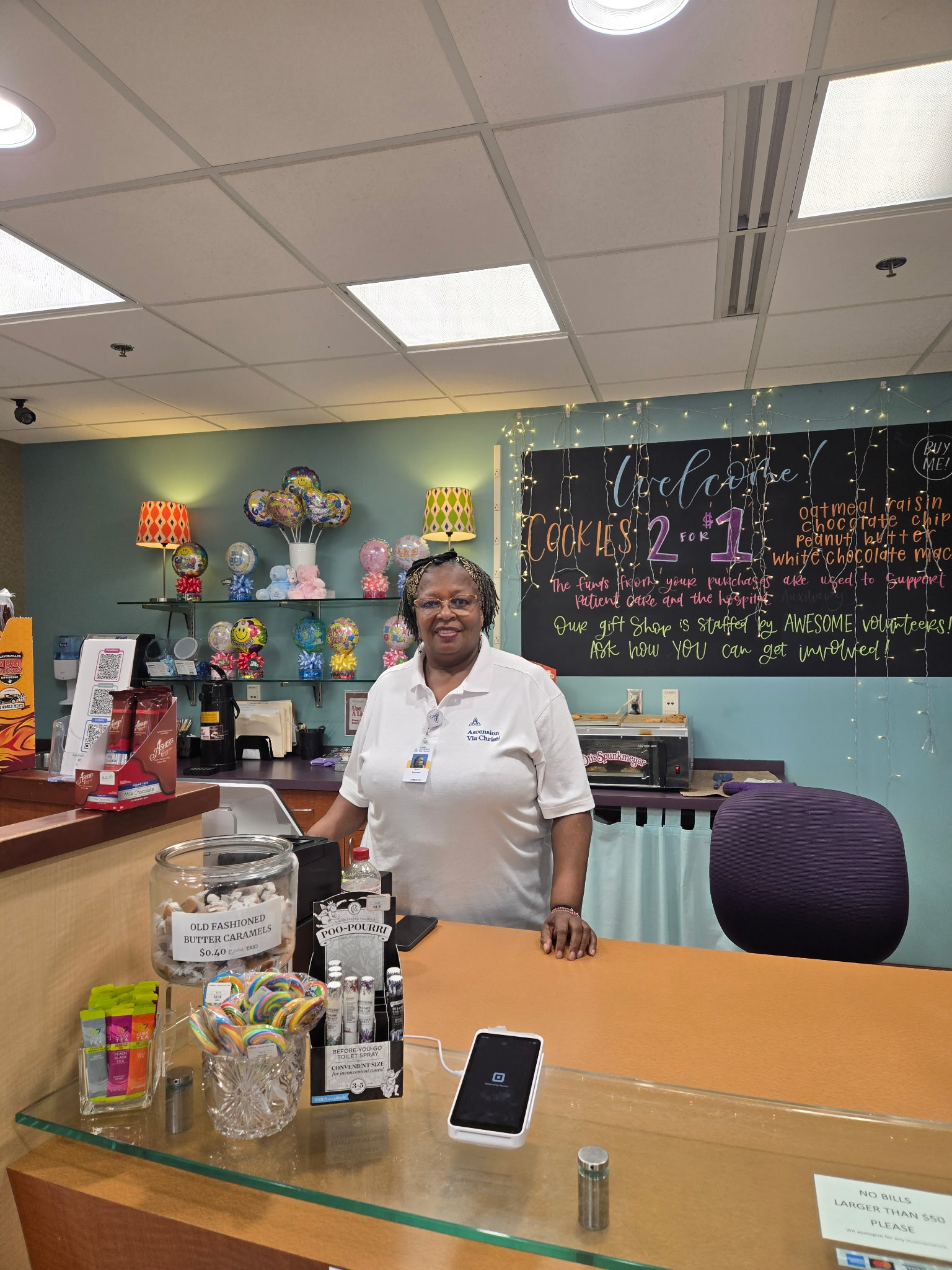 Wanja volunteering at hospital gift shop