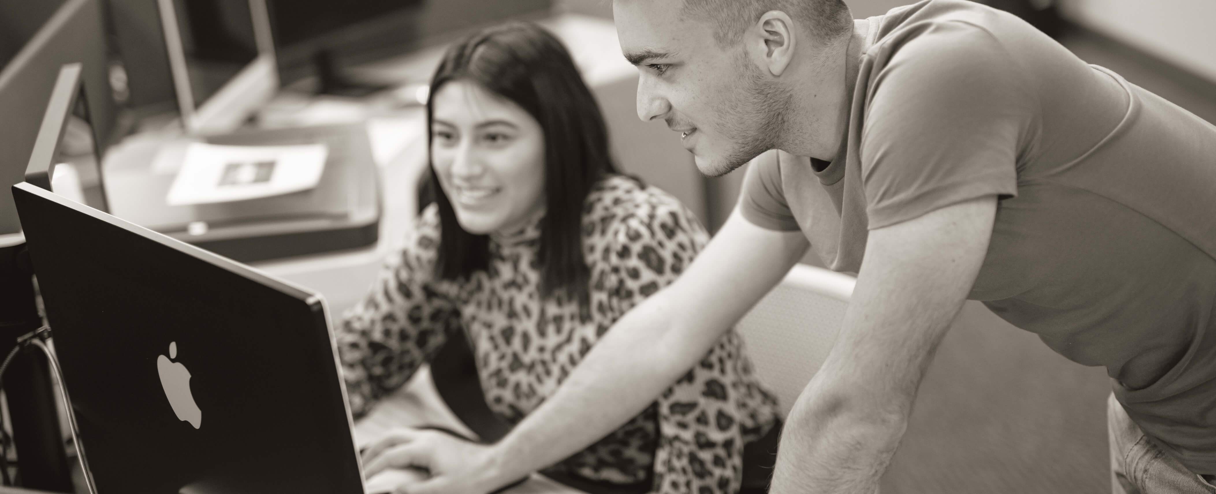 two students with computer