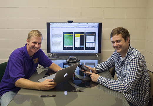 Jesse Poland, left, assistant professor of plant pathology, and Trevor Rife, graduate research assistant in plant pathology