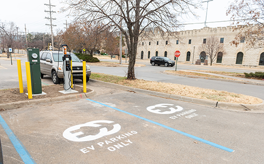 The electric vehicle charging station is near West Stadium.