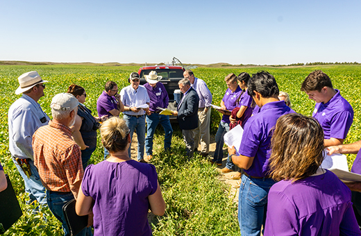 President Richard Linton and a team of K-State faculty, staff and students discuss the Rattlesnake Creek watershed with farmers during the Ford County regional community visit in September 2022. 