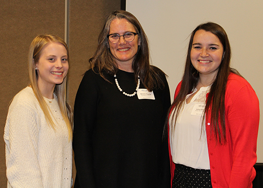 From left, Juliannna Price, senior; Sheila Hayter, ASHRAE president; and Syndey Bellows, senior.