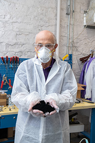 In this photo, Chris Sorensen holds a sample of graphene.