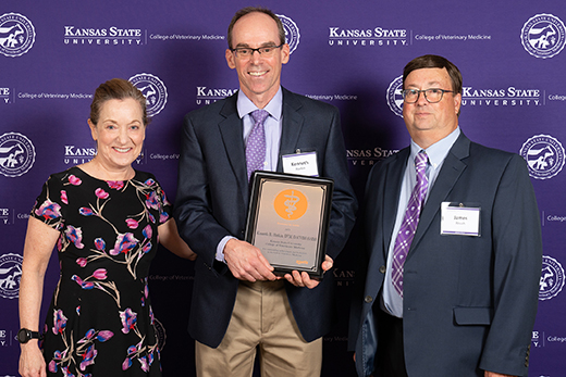 Kenneth Harkin receiving Zoetis award