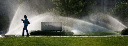 Student in front of Rathbone Hall