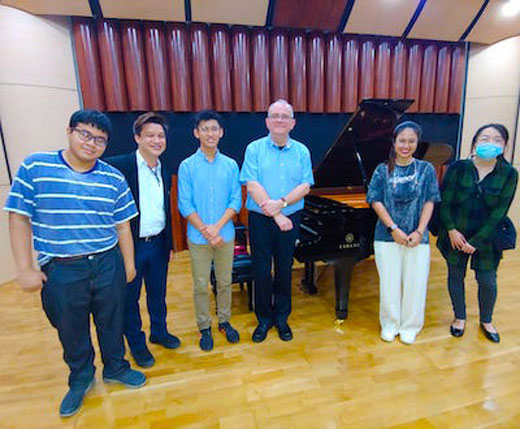 Piano professor performs and teaches in Bangkok