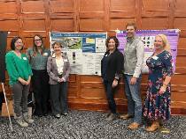 faculty with poster 