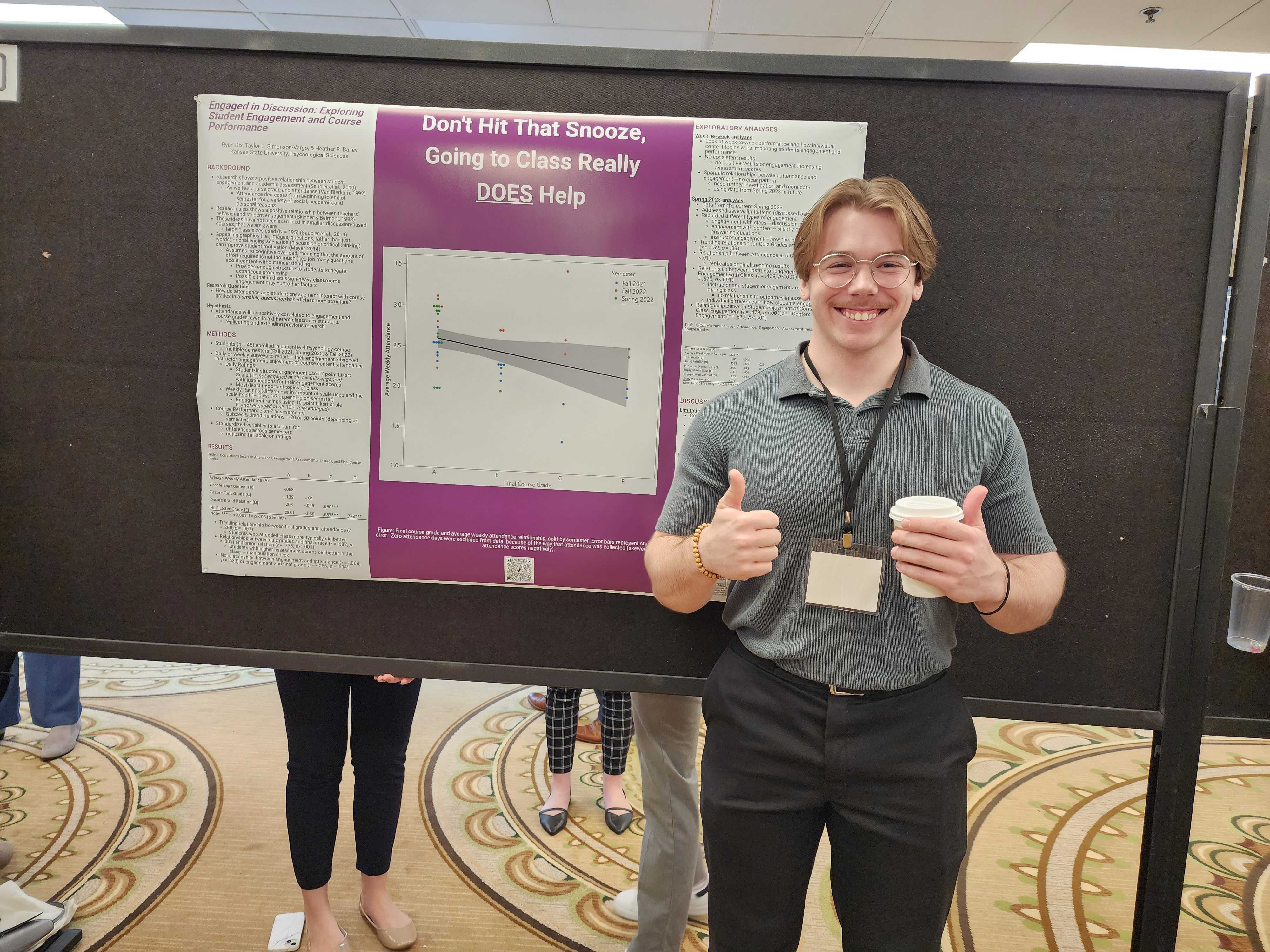 This is undergraduate, Ryan, presenting his poster titled "Don't Hit That Snooze, Going to Class Really DOES Help".