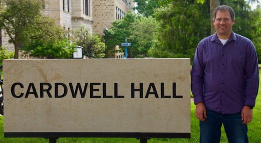 Craig Spencer near Cardwell Hall sign
