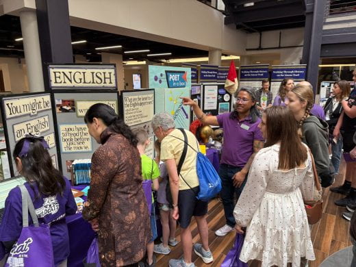 photo of people browsing the college expo at Open House