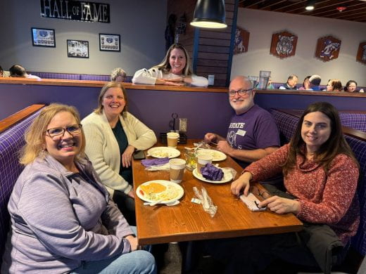 Table of people smiling