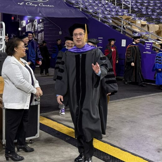 faculty members process into ceremony