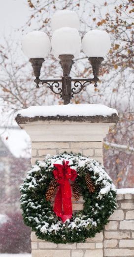 Snow and wreath on Higginbotham Gate