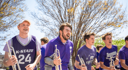 a few smiling trumpet players