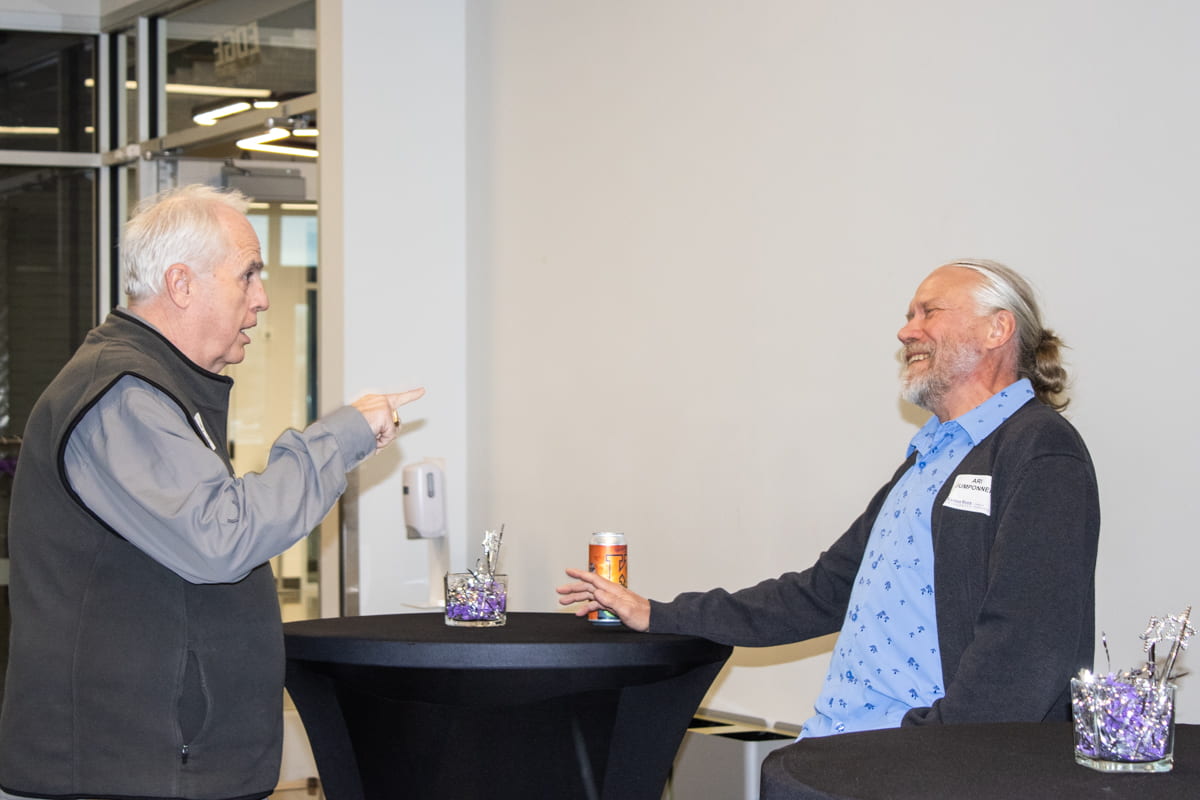 two award celebration guests chatting