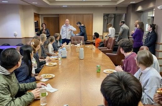 Deans and students at Grad Student Appreciation Pizza Party