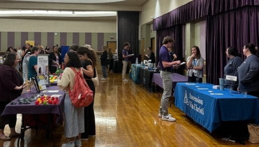 Photo of attendees and exhibitors at Helping Professions Networking Night event Oct. 8, 2024