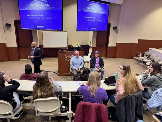Drs. Ryan Rafferty and Spintz Harrison during panel session and back of some audience members